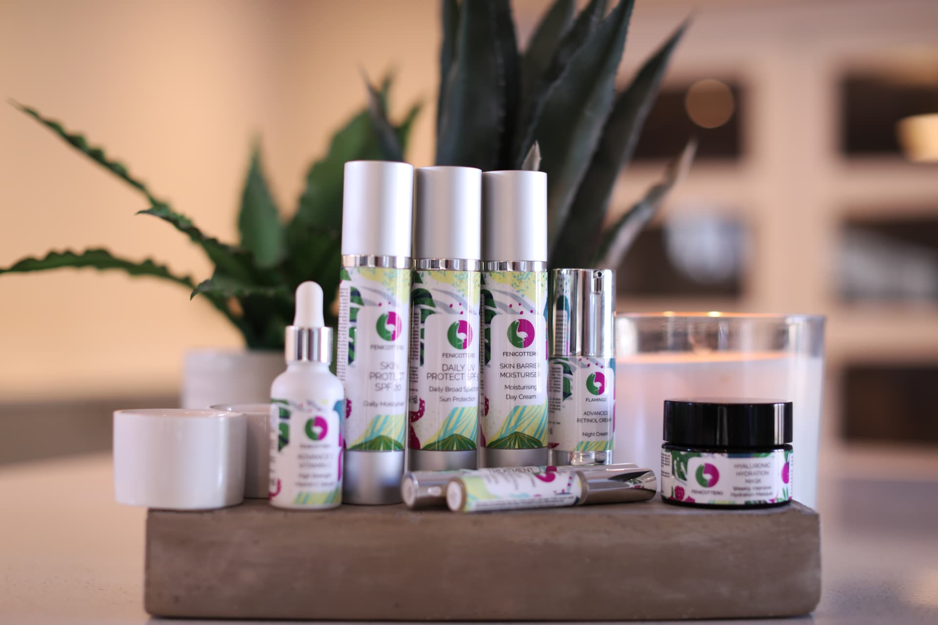 Three fenicottero skincare bottles — Skin Protect SPF 20, Skin Barrier Moisturiser and Daily UV Protect SPF 50